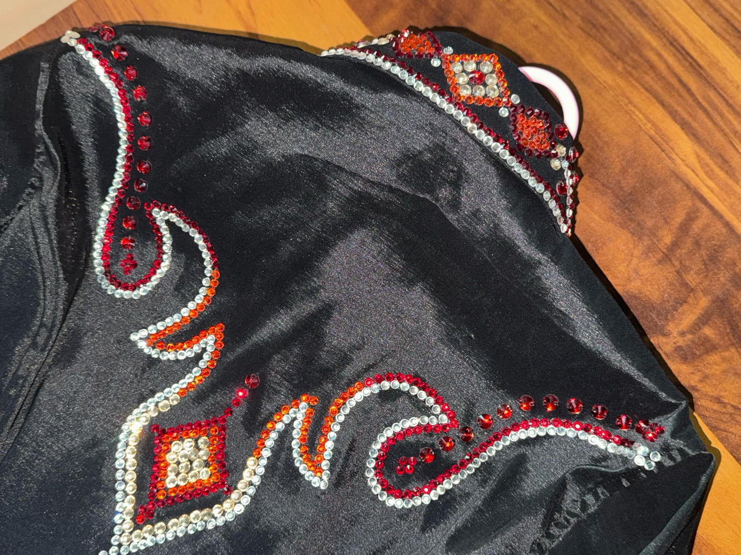 Premium stretchable taffeta shirt  Elegant black with red, orange, and white rhinestone accents